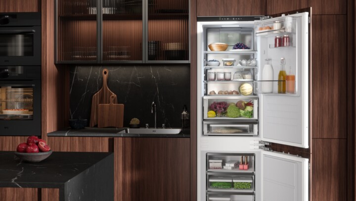 Open fridge and freezer in AEG kitchen